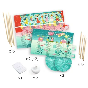 Komponente za sestavljanje dveh lampijonov iz kompleta Djeco Do It Yourself, vključno z barvitimi papirnatimi listi, palčkami in LED svečkami